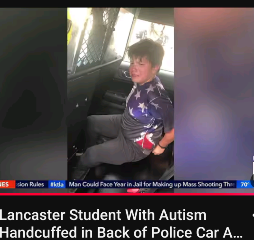 Student in police car — news report of school arrest